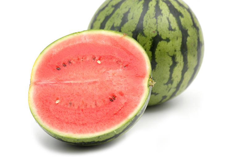 Whole and cut mini watermelons