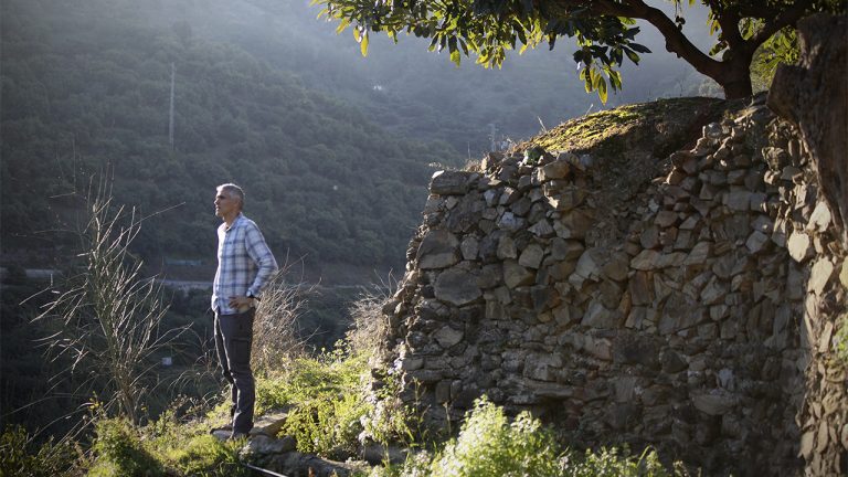 Jose González standing on a terrace