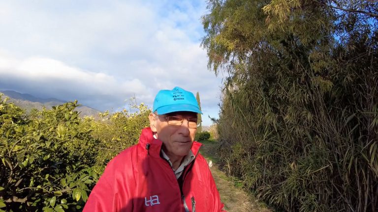 Paco González standing outside